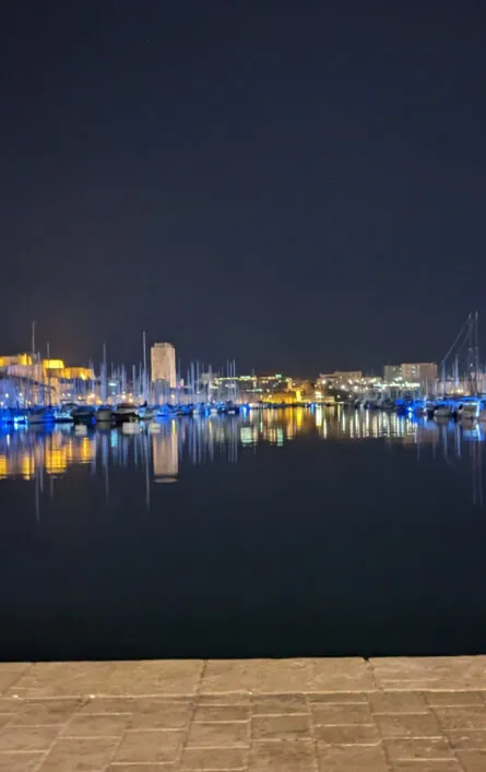A nighttime view of Marseilles harbour near the hackfest event.
